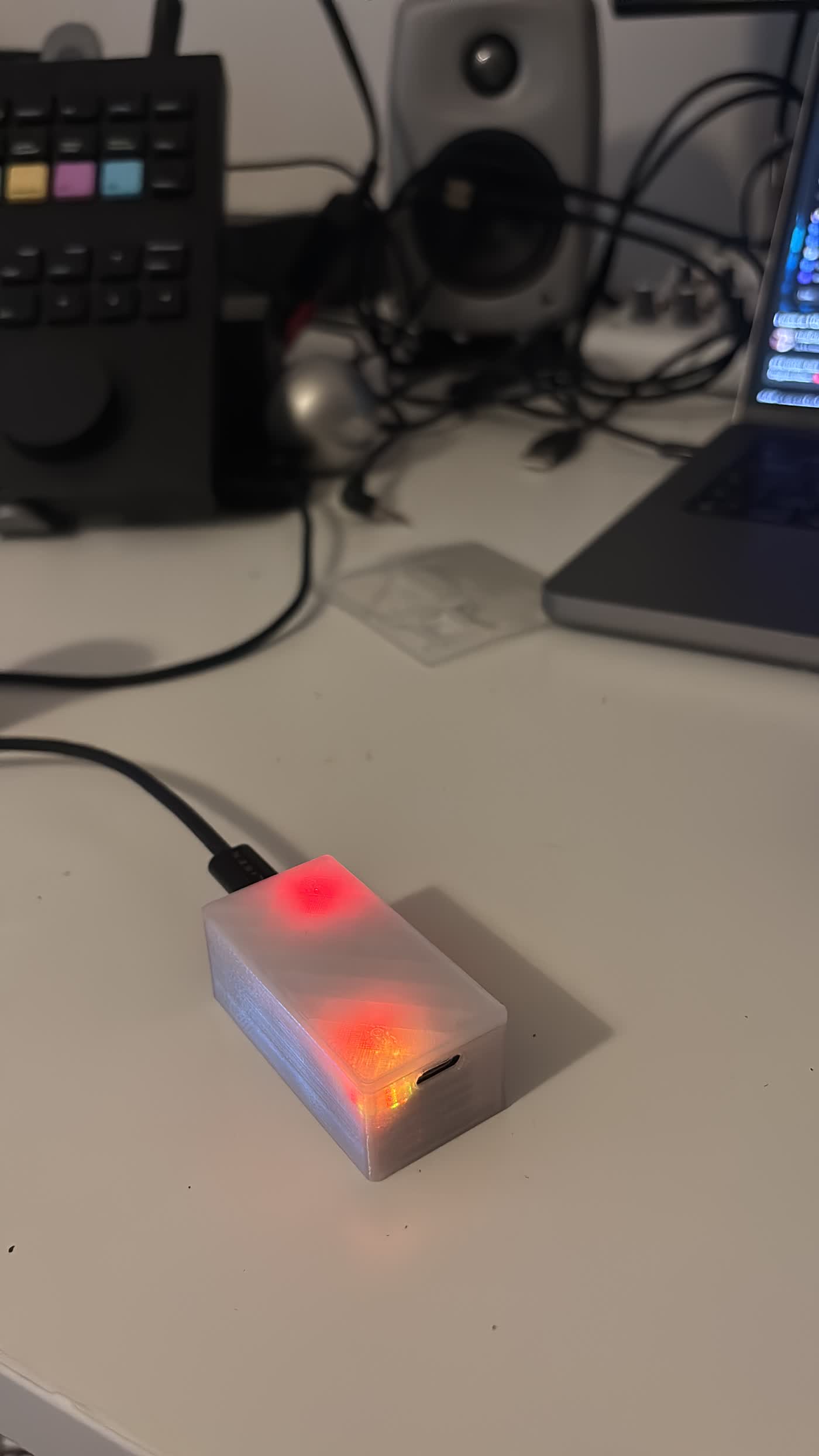 Custom MIDI Bridge PCB powered up and glowing with colored LEDs — test code running successfully on both XIAO modules