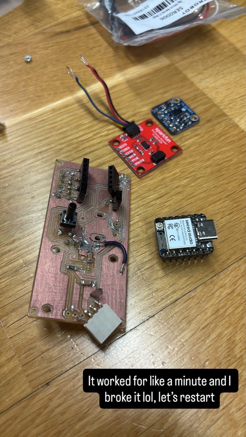 Close-up of a populated milled MIDI controller board with components mounted, sitting on a wooden surface