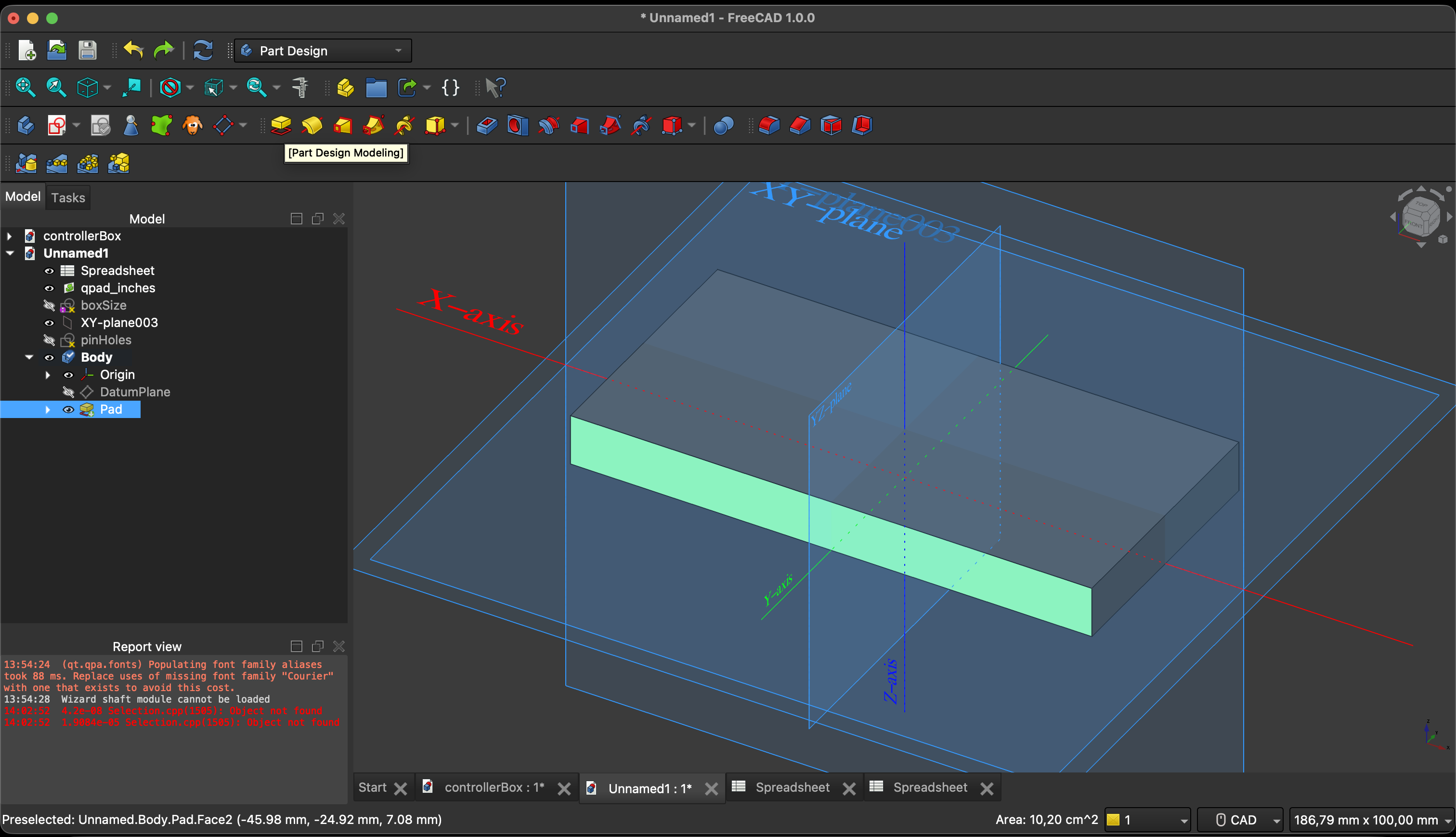 3D model in FreeCAD Part Design workbench showing Pocket operation cutting holes for buttons and screen